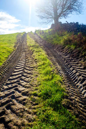 Fresh tractor track in a filed on a sunny day UK