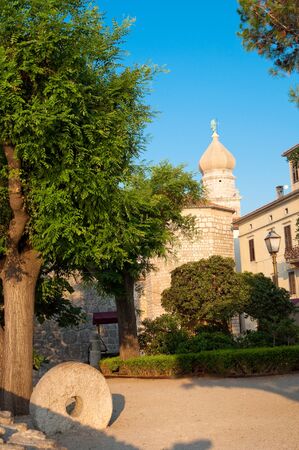 Square beside Frankopan fortress and church belfry at Krk - Croatiaの写真素材
