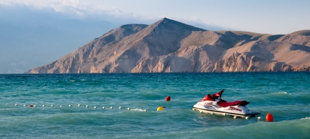 Watercraft on sea coast at Baska in Krk - Croatiaの写真素材
