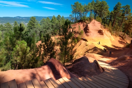 Wooden stairs leading to Le Sentier des Ocres in Roussillon - France horizontalの写真素材
