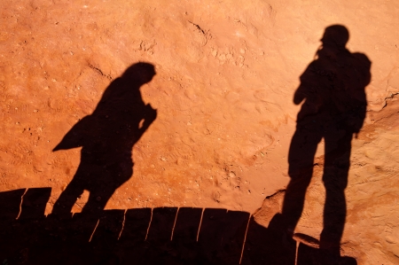 Tourists shadows on Le Sentier des Ocres in Roussillon - Franceの写真素材