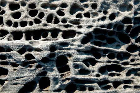 Volcanic tuff rock surface の写真素材