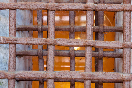 Closeup of ancient iron grate in Aquileia Basilica in Italyの写真素材