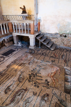 Mosaics and Mary statue inside Basilica di Aquileia in Italyのeditorial素材