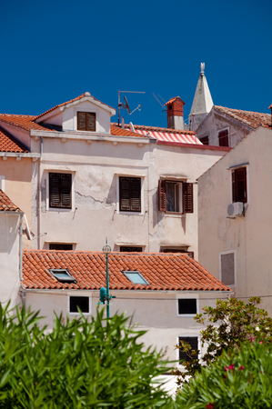 Houses and rooftops at Mali Losinj town in Croatiaの写真素材