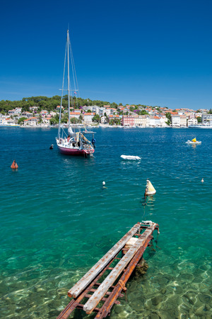 Great sea and boat in Mali Losinj - Croatia Verticalの写真素材