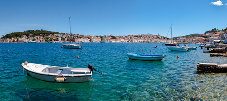 Panoramic view of sea and boats on Mali Losinj bay in Croatiaの写真素材