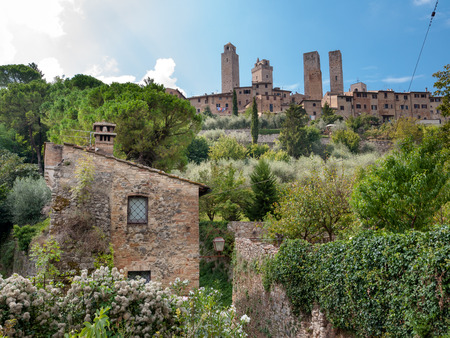 Natural surroundings and town towers horizontal at San Gimignano - Italyの写真素材