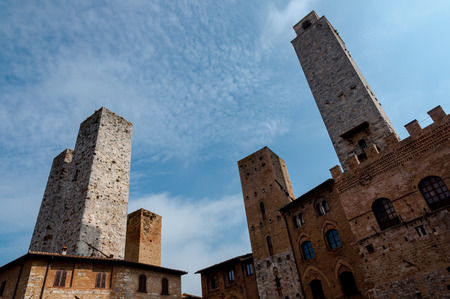 Towers and cloudy sky at San Gimignano - Italyのeditorial素材