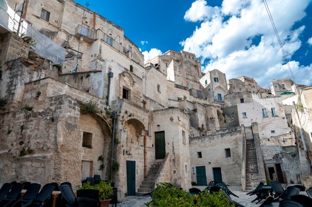 MATERA, ITALY â€“ SEPTEMBER 15, 2014: Street view of buildings in Matera ancient town Sassi di...
