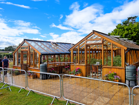 The sacred Tulasi tree (Ocimum Sanctum) in two greenhouses.の写真素材