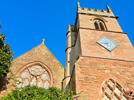 All Saints Church front window and clock tower, West Bromwich, England, UKの写真素材