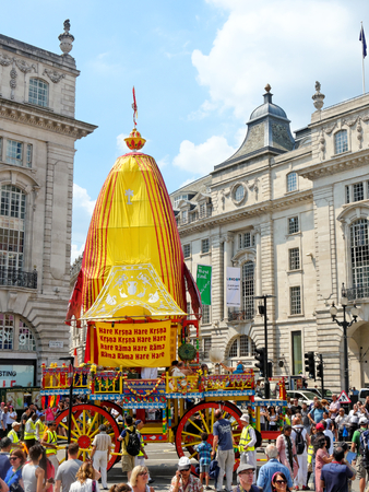 LONDON - JUNE 18: The cart festival called 'Ratha Yatra' in London, June 18, 2017. London is Open, Everyone Welcome, cart is accompanied by a chanting party, dancing on the street.のeditorial素材