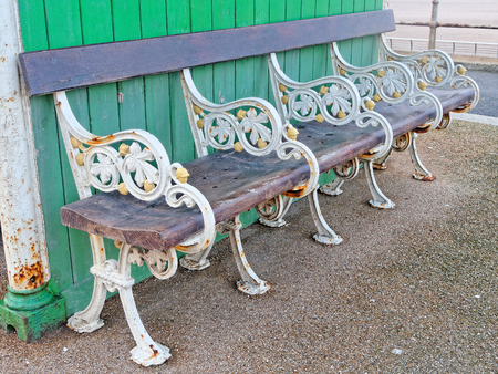 Antique bench on the Blackpool promenade.の写真素材