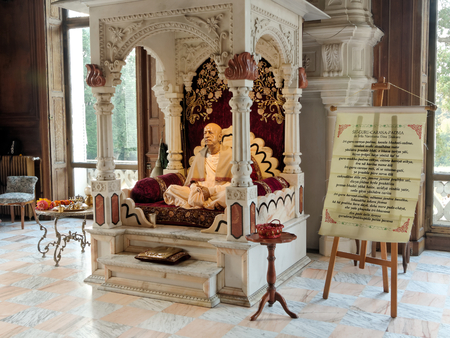 NEW MAYAPUR, AUGUST 15: Srila Prabhupada Murti and the words of the song to the spiritual master in the Hare Krishna temple, FRANCE, 2018.のeditorial素材