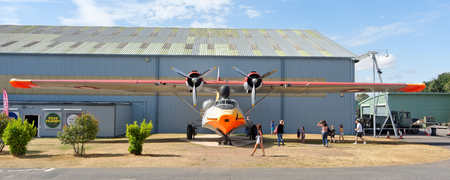 Cosford, August 07: Royal Air Force Museum ,UK 2018. Visitors are watching the plane Consolidated -...