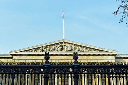 The British Museum with a mast above the main entrance in London, Englandのeditorial素材