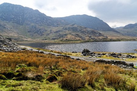 A view of the lake on the Cwmorthin Waterfall trail in the mountains of Snowdonia National Park, Wales.の写真素材