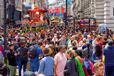 The cart festival called Rathayatra in London, wooden cart accompanied by a chanting party. June 16,...