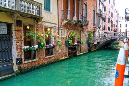 The canal between historic buildings in Venice, May 5, Italy 2019のeditorial素材