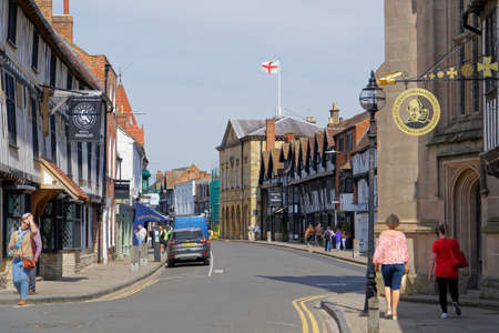 Stratford-Upon-Avon Town Hall with the flag of England waving on the roof in Stratford-upon-Avon,...