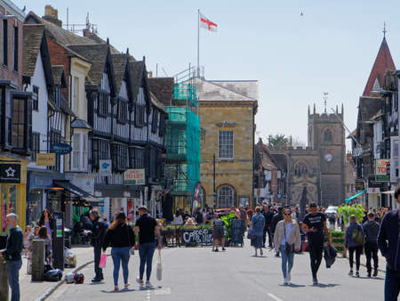 Stratford-Upon-Avon Town Hall with the flag of England waving on the roof in Stratford-upon-Avon, April 24, UK 2021のeditorial素材