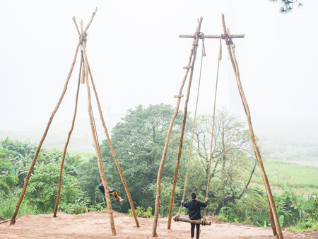 Bamboo swing on the mountianの写真素材