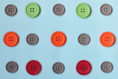 Composition of buttons in blue background.