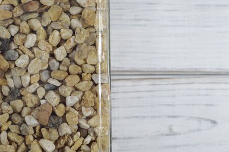 Bottle with little stones photo for your decoration projects or interiorism publications.の写真素材