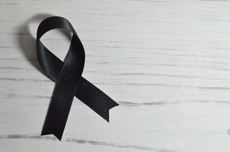 Black ribbon photo for your health and prevention projects or funeral publications.の写真素材