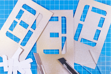 Stencil in table photo for your painting projects or stencil publications.の写真素材