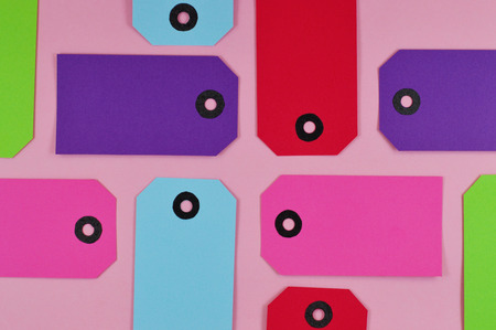 Set of colorful labels made of paper with pink background
