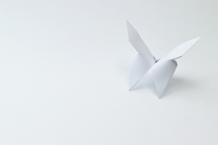 Origami figure paper in white backgroundの写真素材