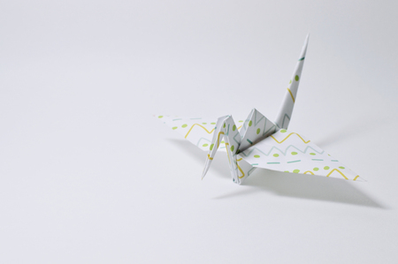 Origami figure paper in white backgroundの写真素材
