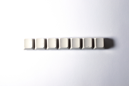 Plastic keyboard keys showing messages and commands