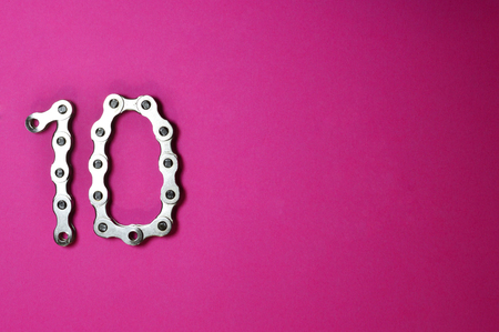 Iron bike chain showing numbersの写真素材