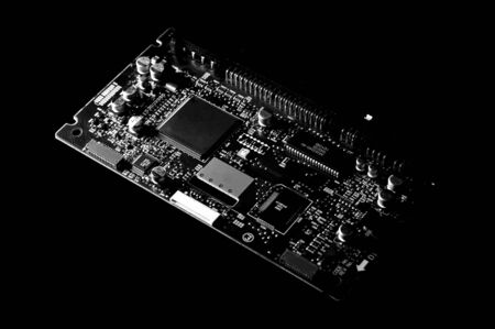 Black and white template of circuit board on dark background.
の写真素材