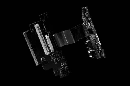 Black and white template of circuit board on dark background.
の写真素材