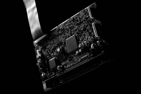 Black and white template of circuit board on dark background.
の写真素材