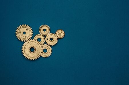 Template of golden plastic gears for industry projects or mechanics topics.