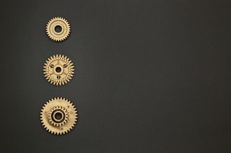 Template of golden plastic gears for industry projects or mechanics topics.の写真素材