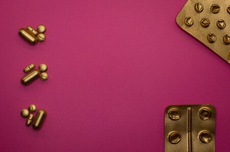 Template of golden blister pack and pills for health projects or medicine topics.の写真素材