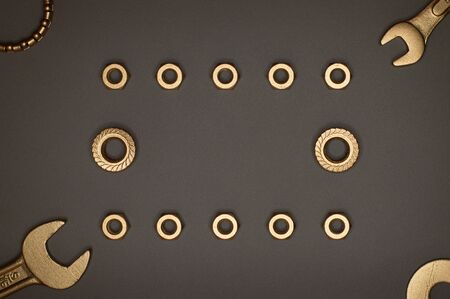 Template of golden tools on dark background for industry projects or mechanics topics.