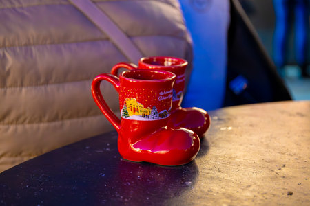 Two Christmas shoes mug on tableの写真素材