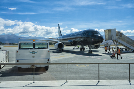 Queenstown, New Zealand - January 19, Air New Zealand Black Livery Airbus being prepared for takeoff at Queenstown Airport.のeditorial素材
