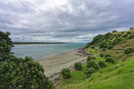 Taurang New Zealand, January 15, 2018: Beach in Mount Maunganui with sand writings. Mount Maunganui is also the name of the large lava dome which was formed by the upwelling of rhyolite lava about two to three million years ago. It is officially known by のeditorial素材