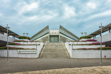 Singapore  - July 3, 2018: Indoor stadium entrance with stairs and sign in viewのeditorial素材