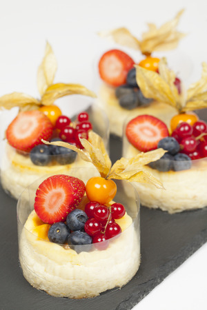 4 cake on black dishの写真素材