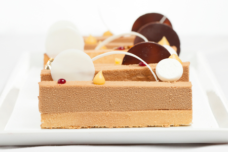 three cake on white dishの写真素材