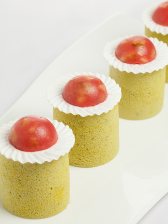 cakes on white dish & white backgroundの写真素材